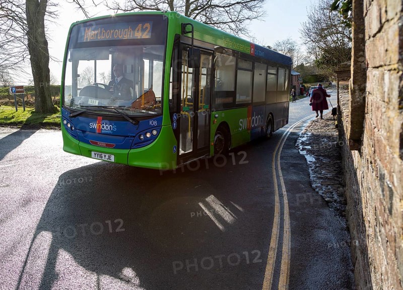 Green single decker service to Marlborough Swindon bus company bus at Avebury, Wiltshire, England, UK