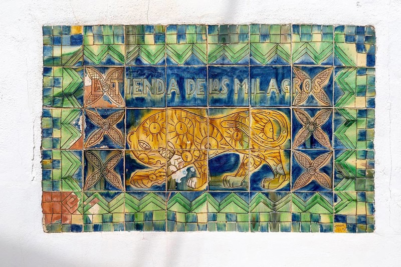 Tiles forming sign for ceramic and textile shop, La Tienda de los MIlagros, Nijar, Almeria, Spain, Europe
