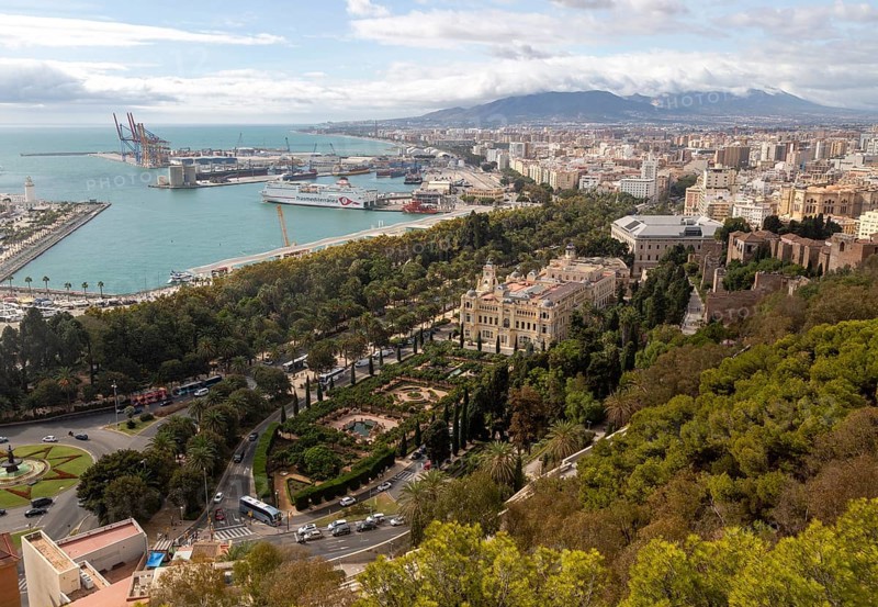 Cityscape view over city centre and dock area Malaga, Andalusia, Spain, Trasmediterranea ferry ship in port, city hall Ayuntamiento centre, Europe