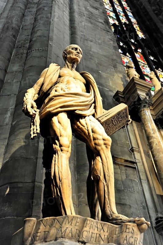 Sculpture of St Bartholomew in front of Milan Cathedral, Duomo, construction started in 1386, completed in 1858, Milan, Milano, Lombardy, Italy, Europe
