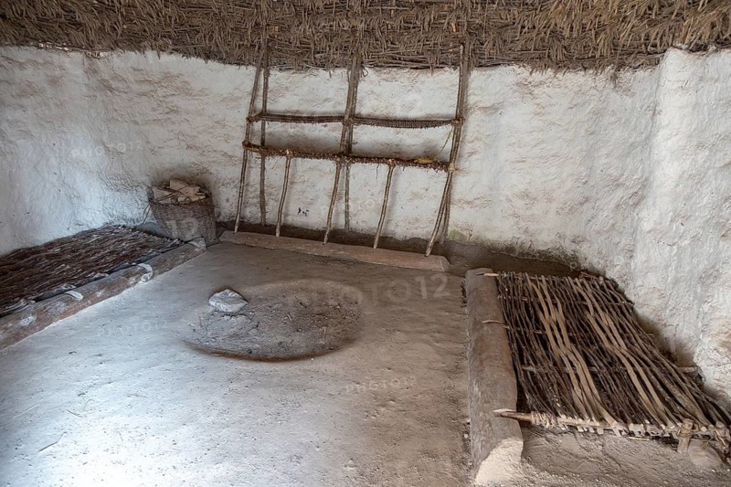 Re-creation of neolithic home, contents, furniture, beds, Stonehenge, Wiltshire, England, UK