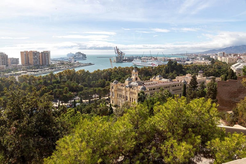 Cityscape view over city centre and dock area Malaga, Andalusia, Spain, Trasmediterranea ferry in port, city hall Ayuntamiento in centre, Europe