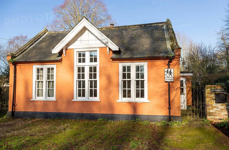 Old village school building converted to private house, Darsham, Suffolk, England, UK