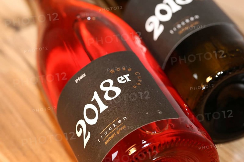 Close-up of two horizontal wine bottles from the Norbert Gross winery in Meckenheim (Palatinate)
