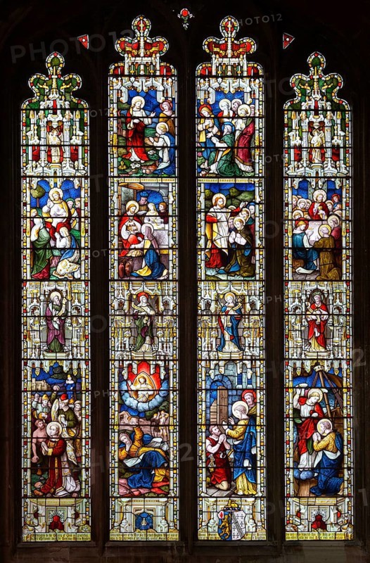 Stained glass window East Bergholt church, Suffolk, England, UK, five tiers of biblical scenes c 1865 by Lavers, Barraud and Westlake