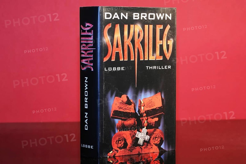 Close-up of the novel Sacrilege by Dan Brown