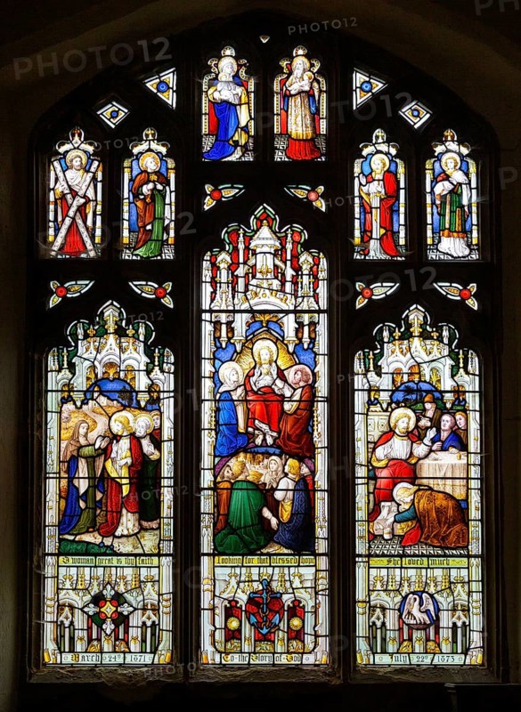Stained glass window East Bergholt church, Suffolk, England, UK, Acts of Mercy c 1873 by Lavers, Barraud and Westlake