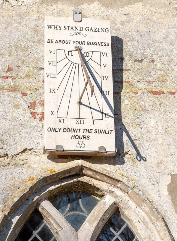 Sundial church of St Michael South Elmham, Suffolk, England, UK Why Stand gazing Be About Your Business