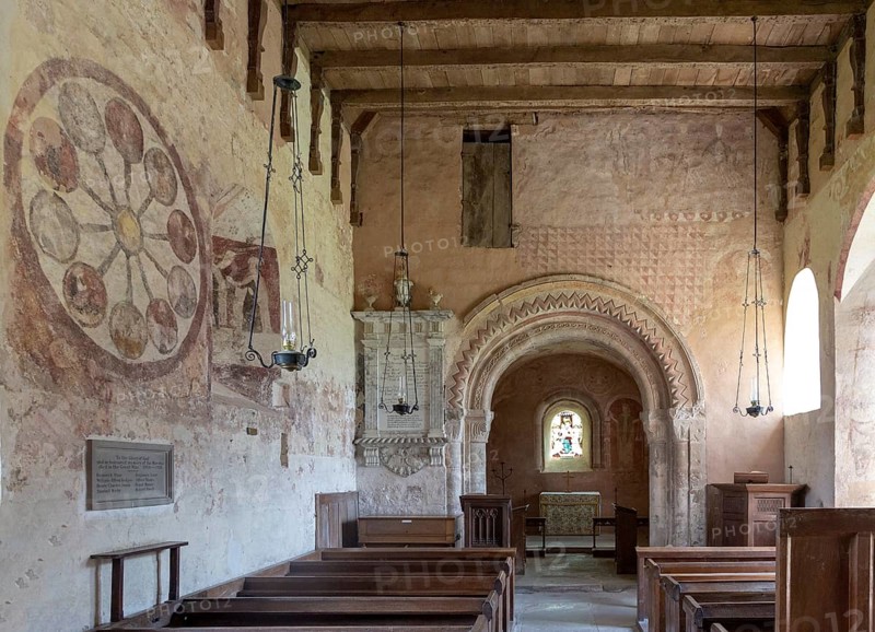 Medieval frescoes church of Saint Mary, Kempley, Gloucestershire, England, UK, Norman chancel arch