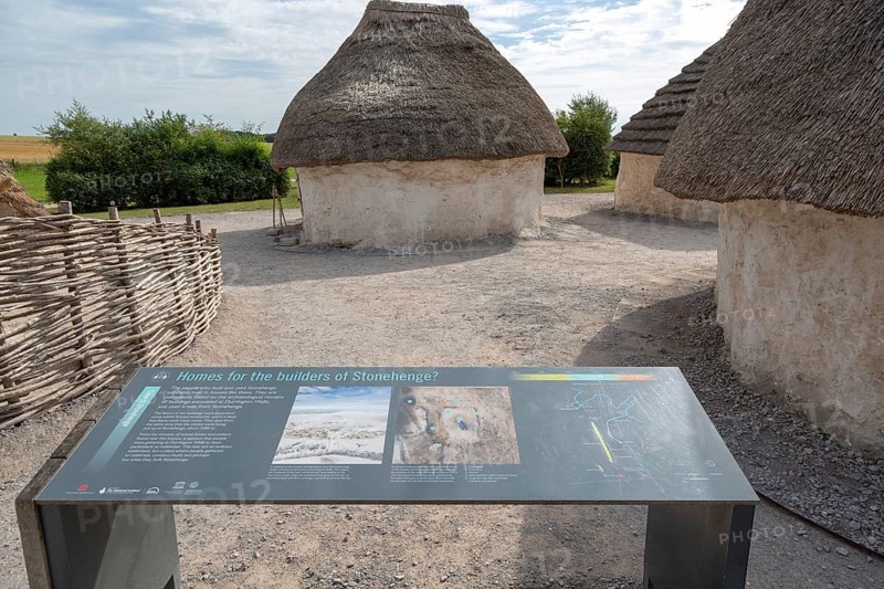 Reconstruction of neolithic homes thatched round houses huts, Stonehenge, Wiltshire, England, UK