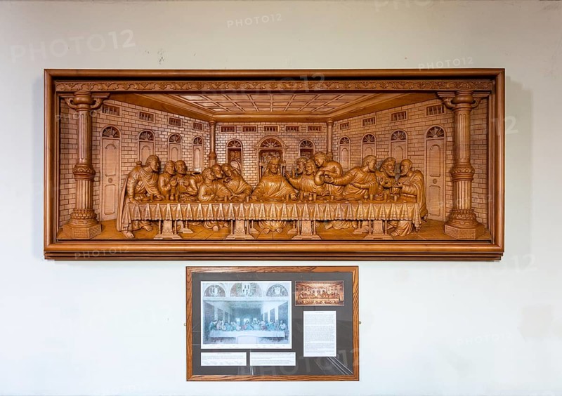 Village parish church of Saint Michael and All Angels, Hilperton, Wiltshire, England, UK teak wood carving of Last Supper