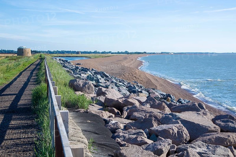 Shingle bay bar and lagoon landforms with rock armour coastal defences at Bawdsey, Suffolk, England, UK
