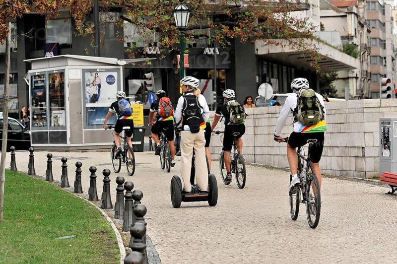 Tourists on a cruise ship during a shore excursion with bicycles and Segway, Praca Marques de Pombal, Lisbon, Lisboa, Portugal, Europe