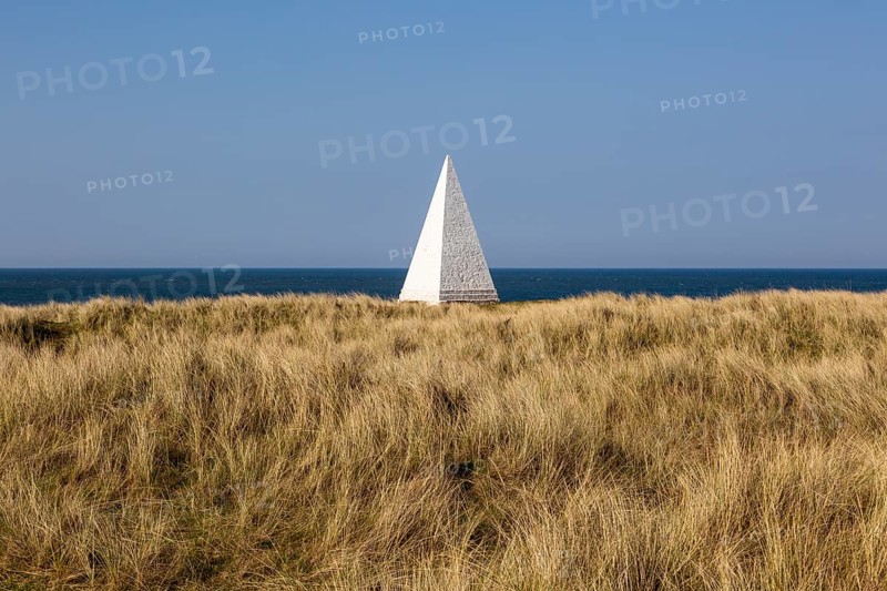 Emmanuel Head white pyramidal navigation beacon, Holy Island, Northumberland, England, UK built 1801-10 by Trinity House