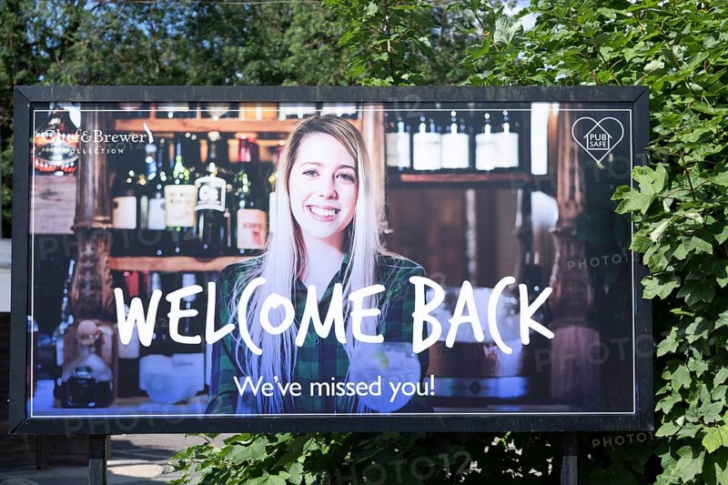 Welcome Back poster sign outside Chef and Brewer pub chain at Martlesham, Suffolk, England, UK July 2020