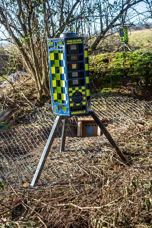 Eviction of badgers clearance of badger sett using metal fencing and one way exit gates, part of HS2 project near Kenilworth, Warwickshire, England, November 2020. Armadillo Videoguard surveillance robots used to observe site and detect protestors