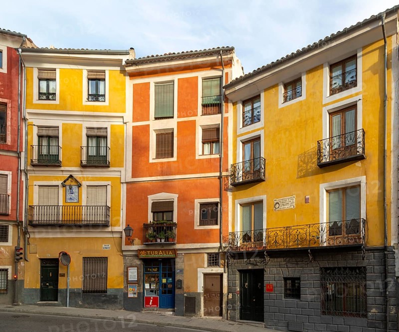 Colourful narrow historic building in a row in old part of city of Cuenca, Castille La Mancha, Spain, Europe