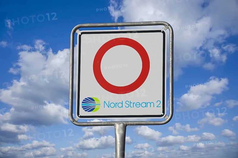 Symbolic image Nord Stream 2: Traffic sign with logo in front of blue sky (Composing)