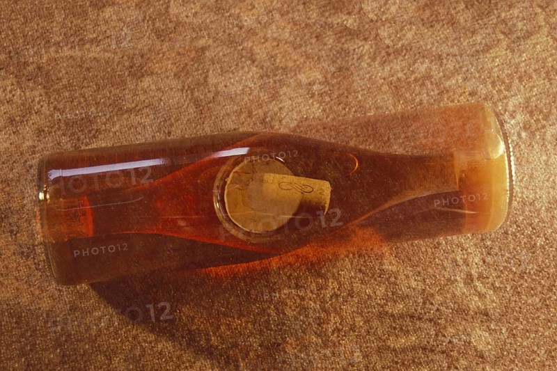 Multiple exposure of a rose wine bottle with wine cork, wine bottle, rose wine, full, view from above, wine-growing region, red, monochrome, studio shot, photo art, double exposure, Ruedesheim, Rheingau, Taunus, Hesse, Upper Middle Rhine Valley, Middle Rhine Valley, Germany, Europe