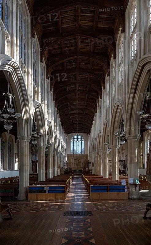 Interior of Holy Trinity Church, Long Melford, Suffolk, England, UK view down nave to east window