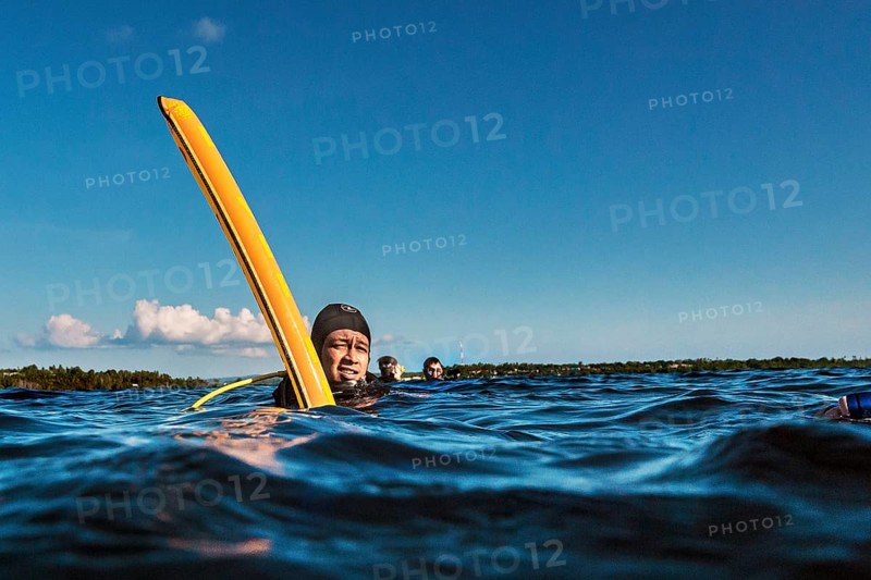 Dive guide with dive buoy, Wakatobi Dive Resort, Sulawesi, Indonesia, Asia