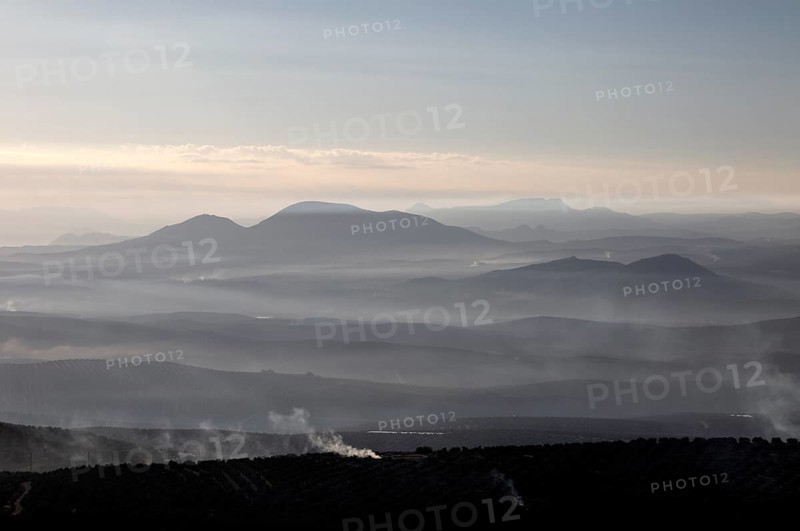 Misty morning view south over Rio Guadalquivir valley from Baeza, Jaen province, Andalusia, Spain, Europe