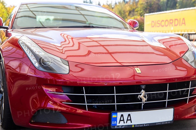 Close-up of a red Ferrari FF (seen at the Ellwanger Berge motorway service area, Baden-Wuerttemberg, Germany)