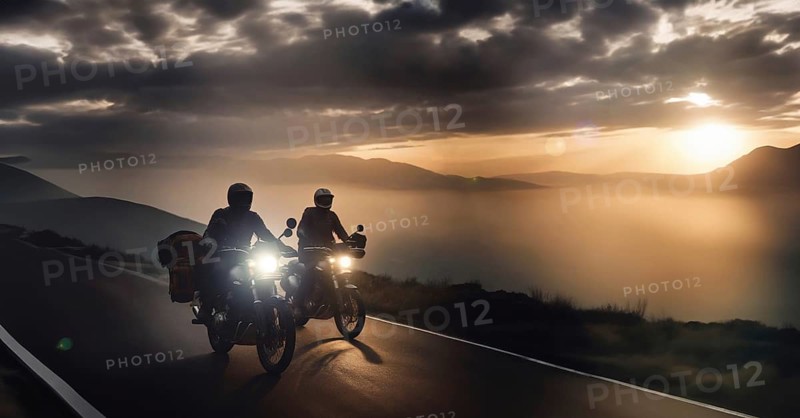 Two motorcyclist friends travel on motorcycles with panniers through the mountains at sunset, AI generated