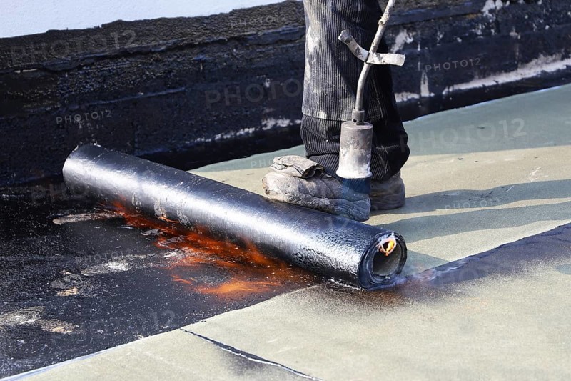 Professional flat roof waterproofing with bitumen welding membranes
