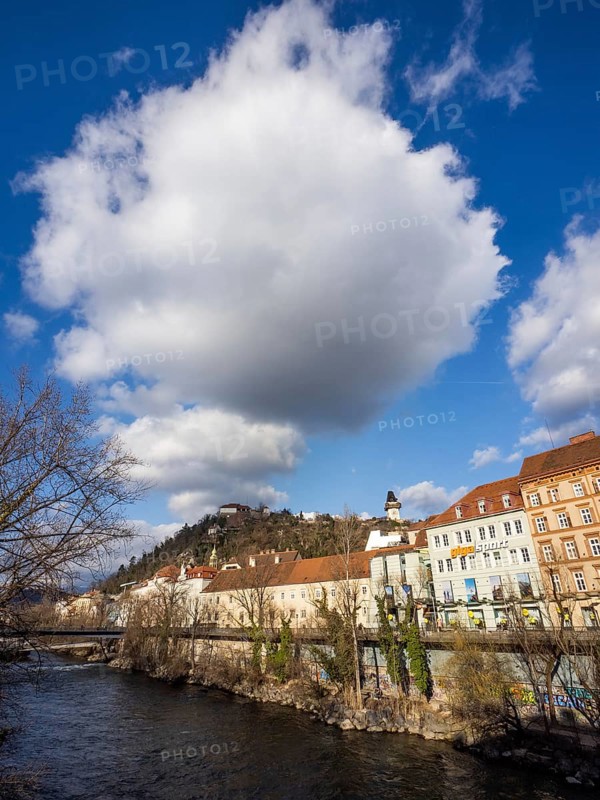 View over the river Mur to the Schlossberg with clock tower, Graz, Styria, Austria, Europe