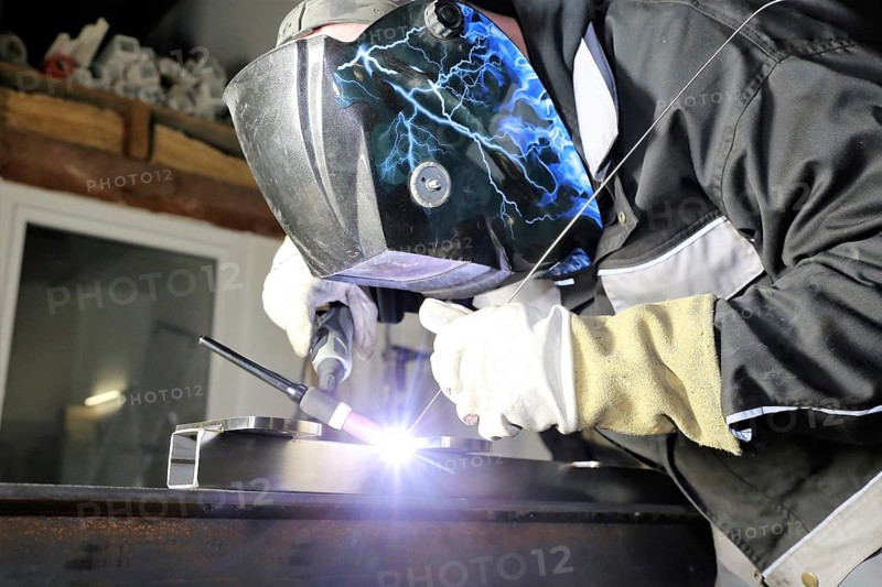 Metal worker during welding work