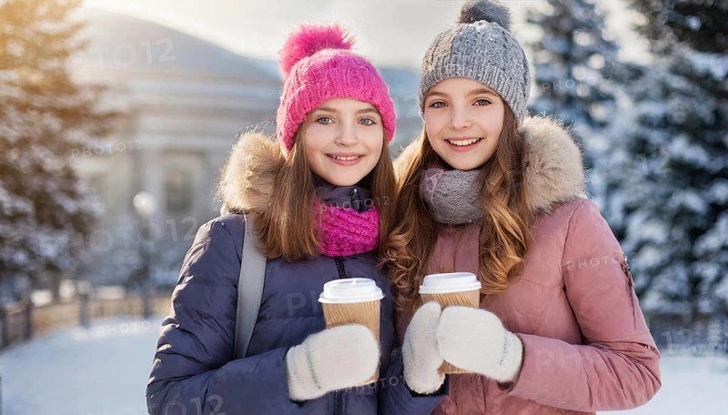 AI generates, human, humans, person, persons, child, children, girl, two, 15, years, outdoor, ice, snow, winter, seasons, drinks, drinking, coffee to go, coffee, cup, paper cup, hot drink, cap, bobble hat, gloves, winter jacket, cold, coldness
