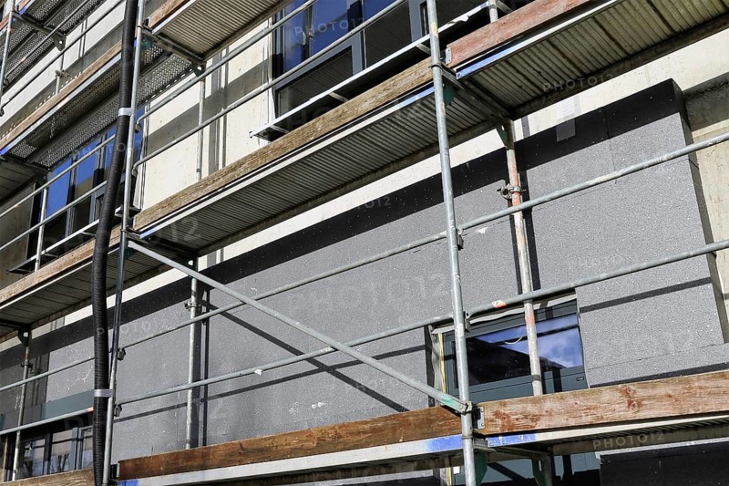 Thermal insulation of a house facade