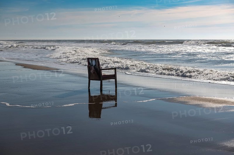Upholstered chair washed up on the North Sea shore, flotsam, Oksbol, Region Syddanmark, Denmark, Europe
