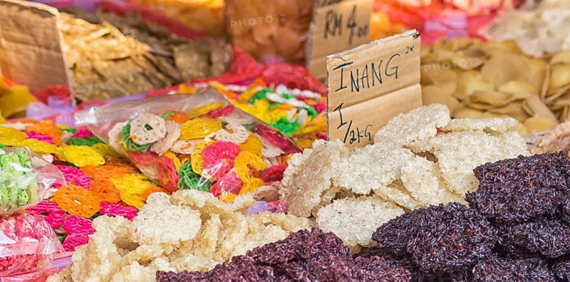 Chinese and Asian food on the market, rice, chips, noodles, sweets