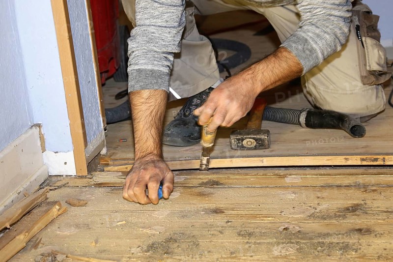 A parquet floor is sanded and oiled