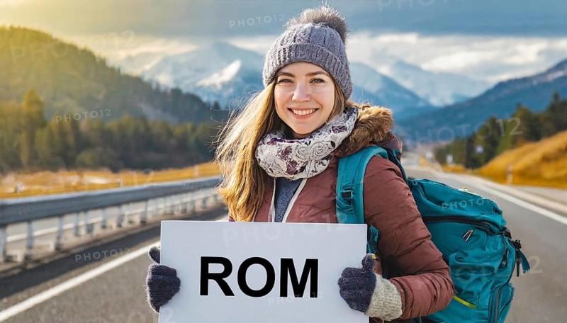 AI generated, human, humans, person, persons, woman, woman, one person, 20, 25, years, outdoor, seasons, cap, bobble hat, gloves, winter jacket, cold, cold, backpack, woman wants to travel, hitchhiking, hitchhiking, hitchhiking, road, motorway, sign saying Rome