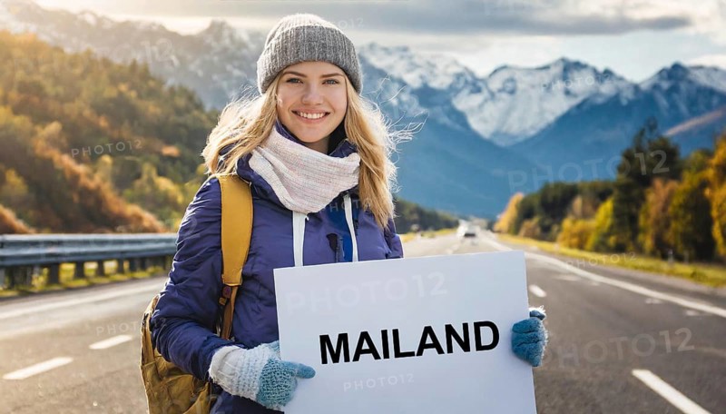 AI generated, human, humans, person, persons, woman, woman, one person, 20, 25, years, outdoor, seasons, cap, bobble hat, gloves, winter jacket, cold, cold, backpack, woman wants to travel, hitchhiking, hitchhiking, hitchhiking, road, motorway, sign saying Milan