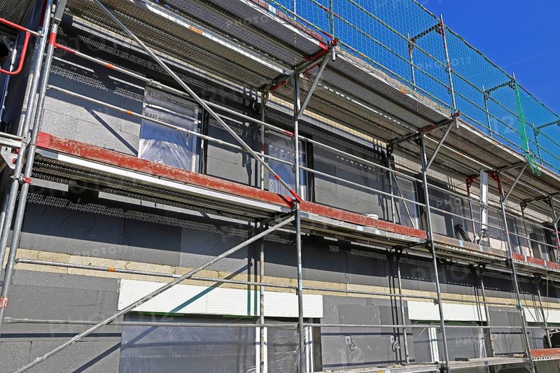 Thermal insulation of a house facade