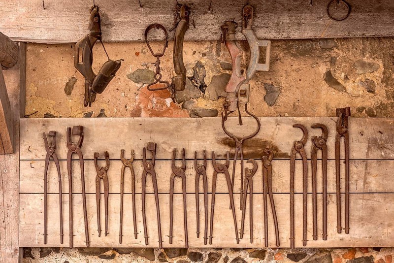 Rusty tongs and tools, blacksmith's forge, blacksmith, inner courtyard, Ronneburg Castle, medieval knight's castle, Ronneburg, Ronneburger Huegelland, Main-Kinzig-Kreis, Hesse, Germany, Europe