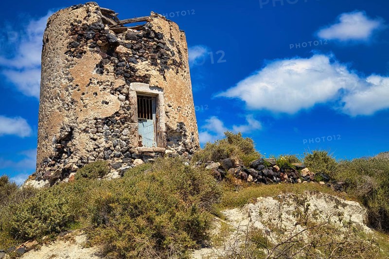 Dilapidated windmill above Emporio, Santorini, Cyclades, Greece, Europe