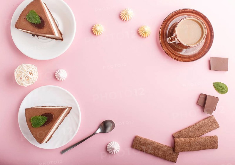 Cake with souffle milk chocolate cream with cup of coffee, meringues on a pink pastel background. top view, flat lay, frame, copy space. breakfast concept