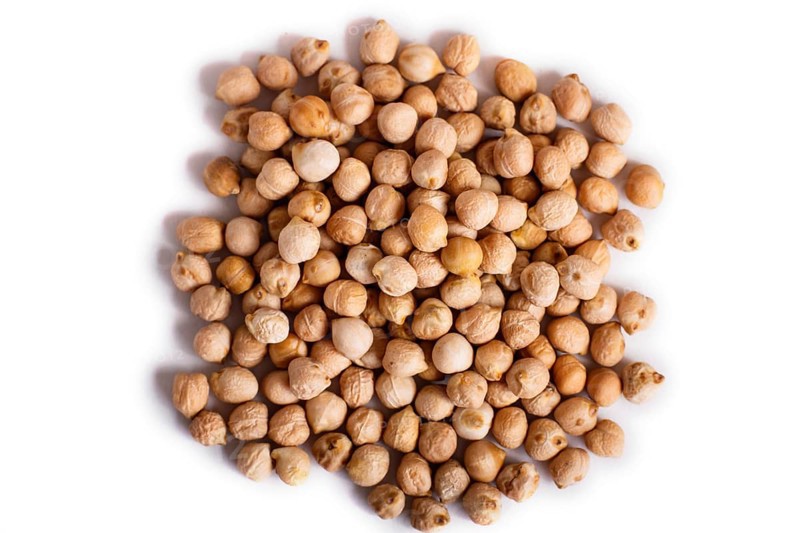 Pile of red lentils isolated on white background. Top view