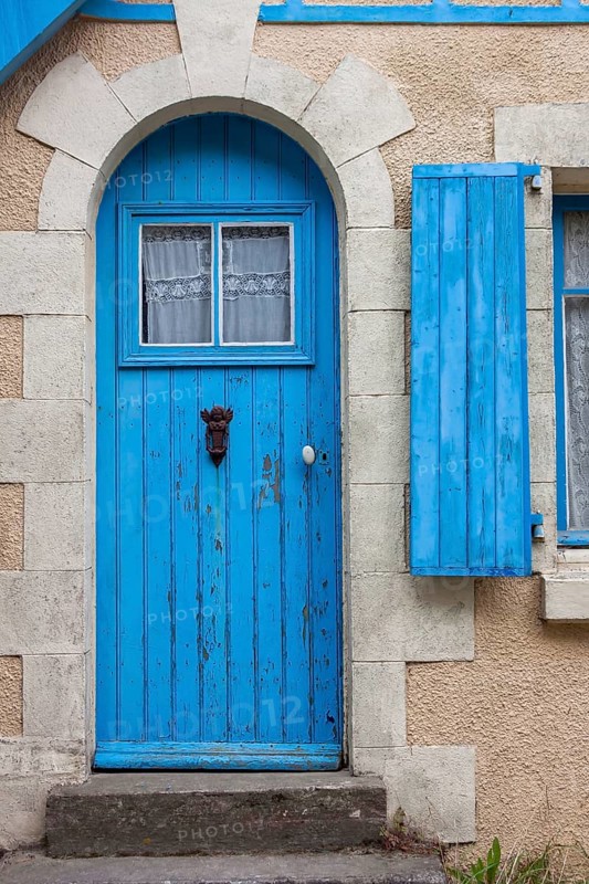 Old house facade with blue door and blue window, Ile de Brehat, Brittany, France, Europe