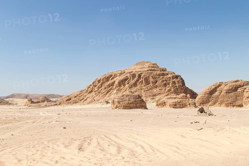 Desert, red mountains, rocks and blue sky. Egypt, the Sinai Peninsula, Dahab