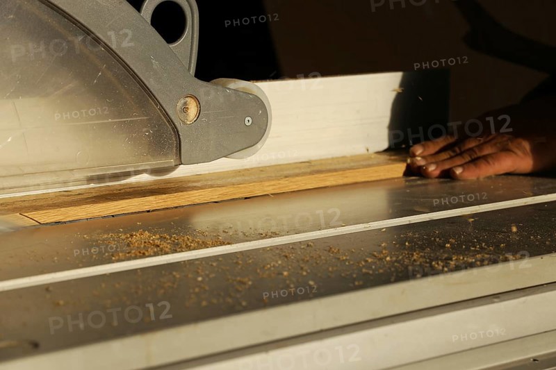 Carpenter at work in his carpentry workshop