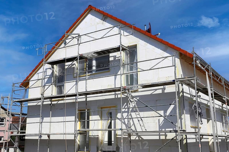 Thermal insulation of a house facade