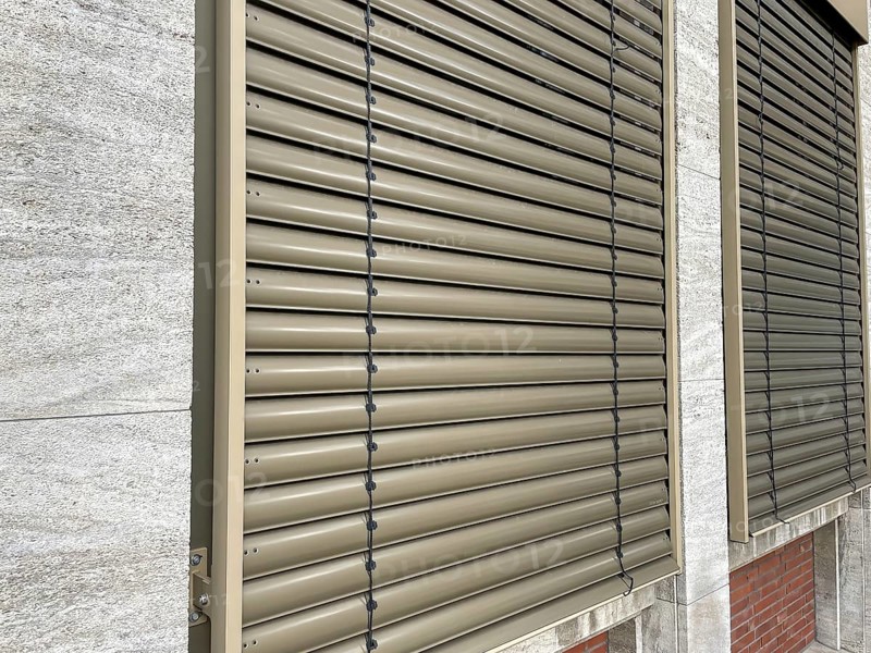 Windows with roller shutters down