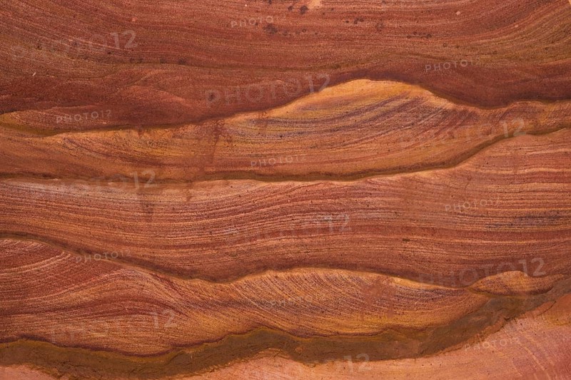 Natural texture of red rocks. Colored canyon, Egypt, desert, the Sinai Peninsula, Nuweiba, Dahab, Africa