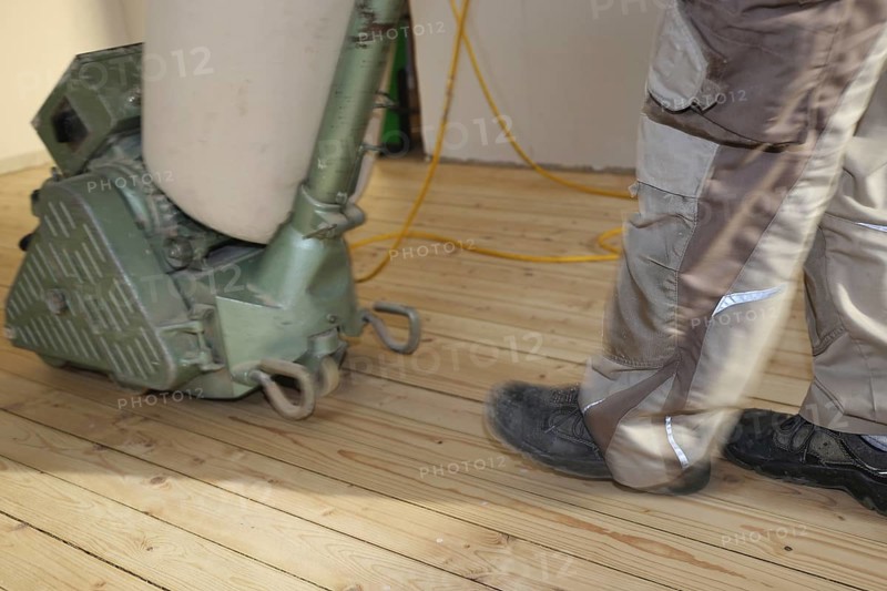 A parquet floor is sanded and oiled